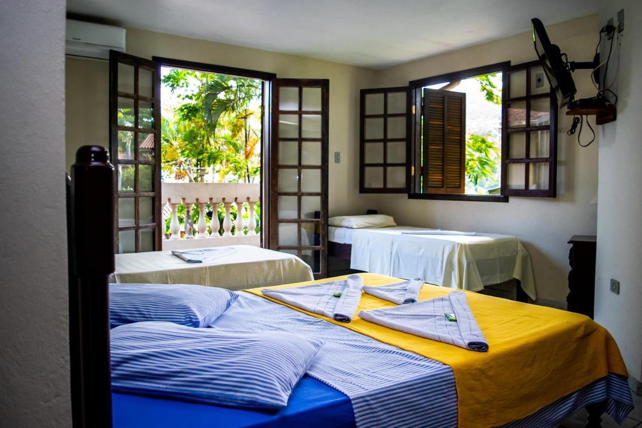 Quarto Quádruplo com Vista Mar